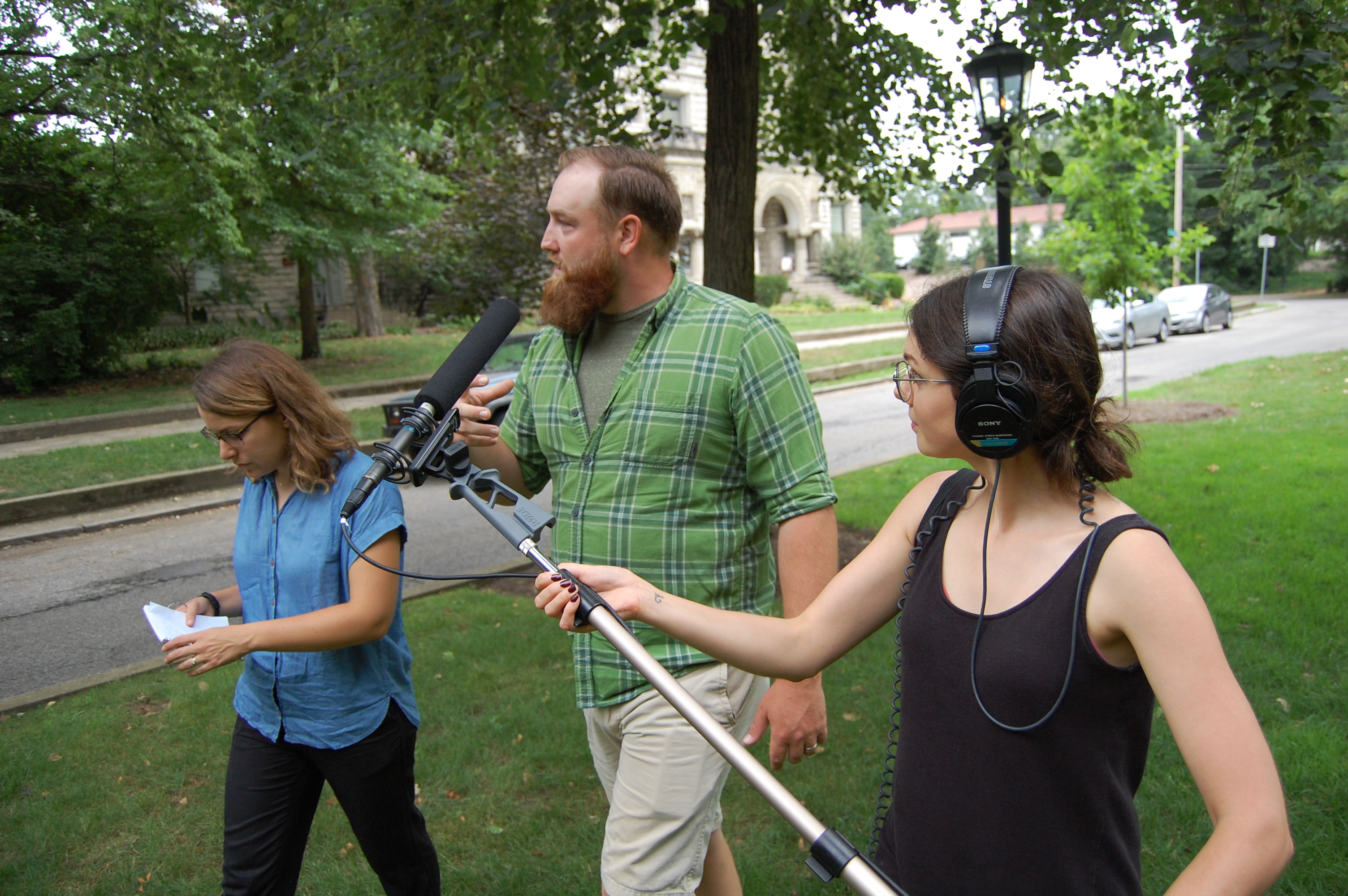 NPR reporters interviewing Ked Stanfield, executive director of Louisville Grows